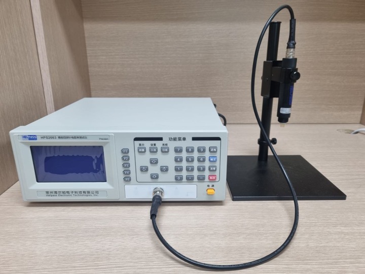 Four-point probe measurement system